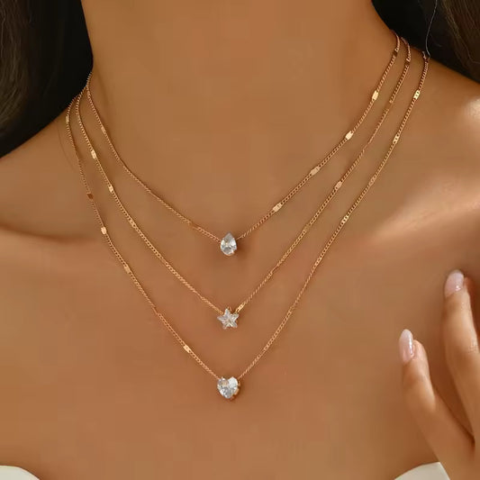 Damesketting goudkleurig – layered ketting met hart, ster en kristal – verstelbaar