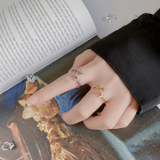 Gilded Grace – Adjustable Open Crossover Ring Hand