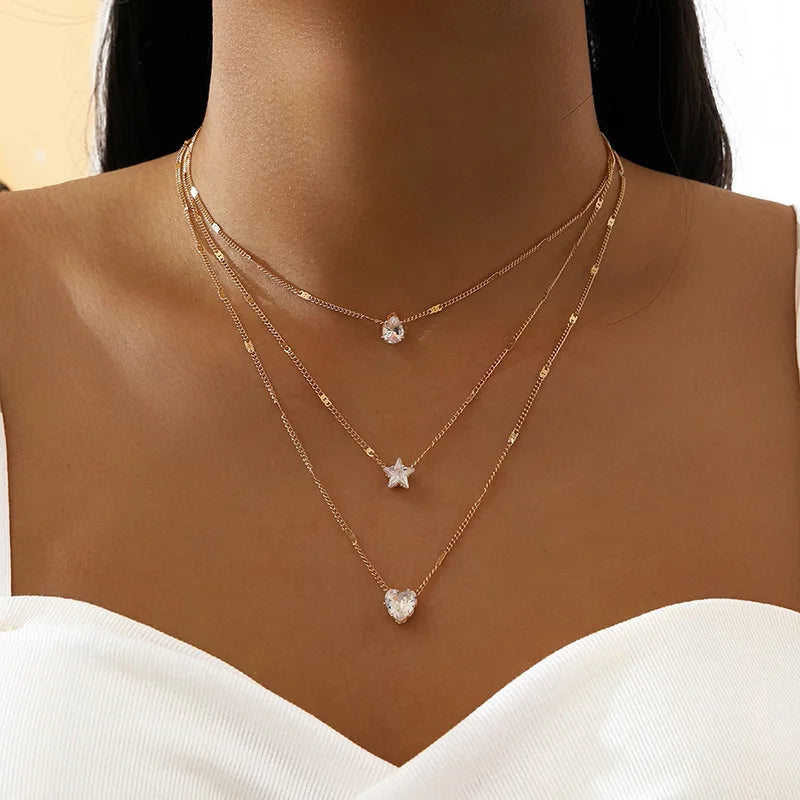 Luxe Layered Elegance – Heart, Star & Crystal Necklace woman
