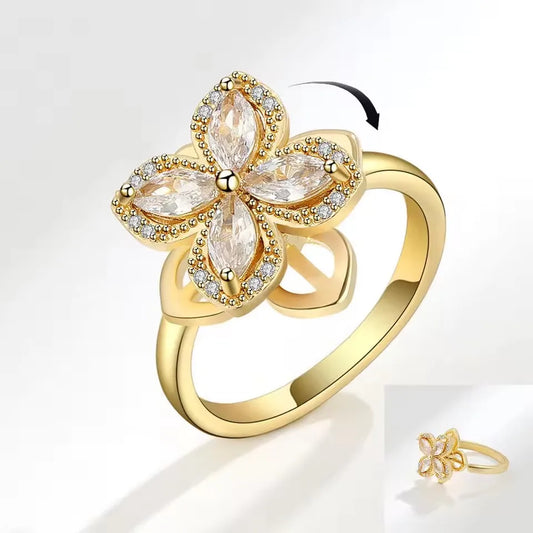 Blossom Glow – Rotating Crystal Flower Ring