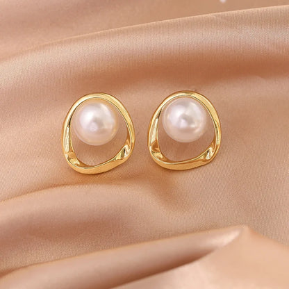Elegant Orbit Pearl Stud Earrings