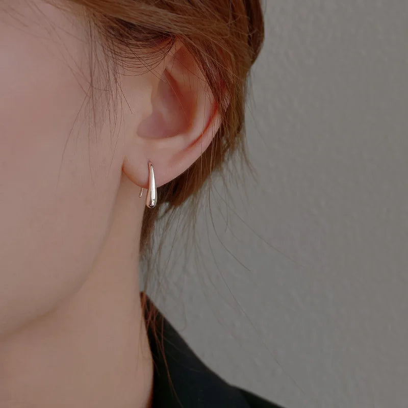 Ethereal Pearl Drop Earrings ear