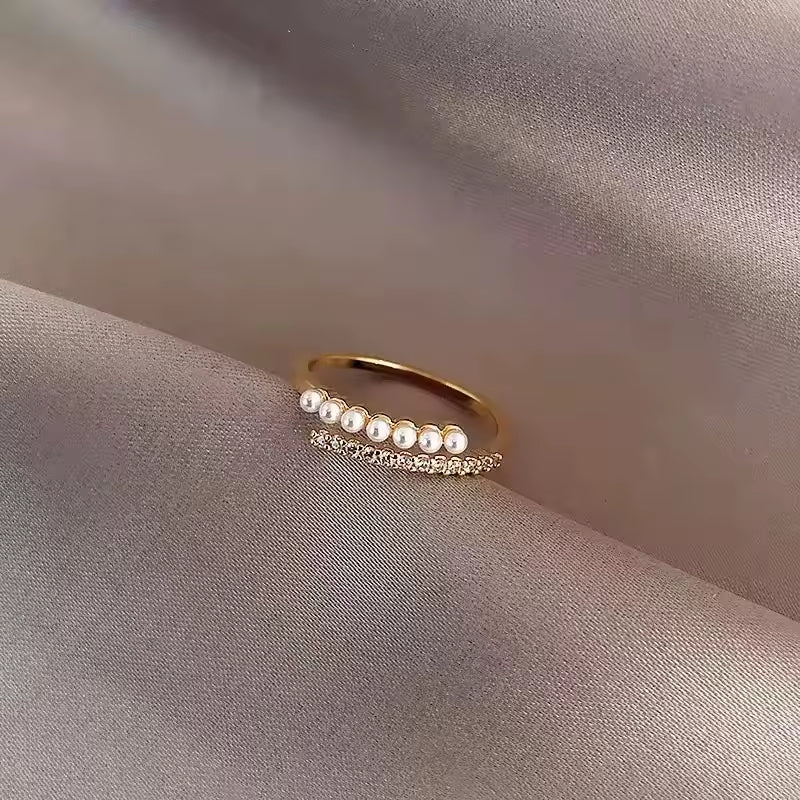 Damesring verstelbaar – Lily Light – delicate open ring met bloembladeren – goudkleurig